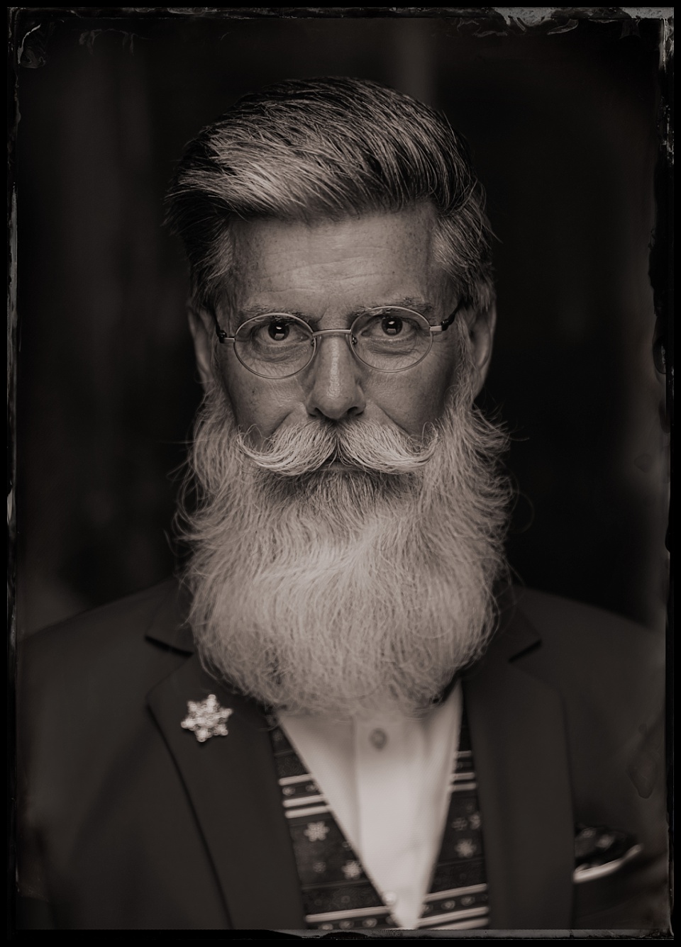 tintype of santa with a natural beard and mustache
