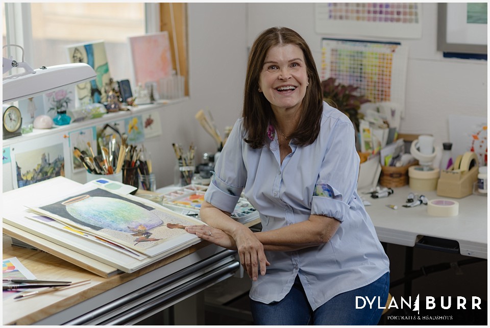 environmental portraits of watercolor artist in her studio